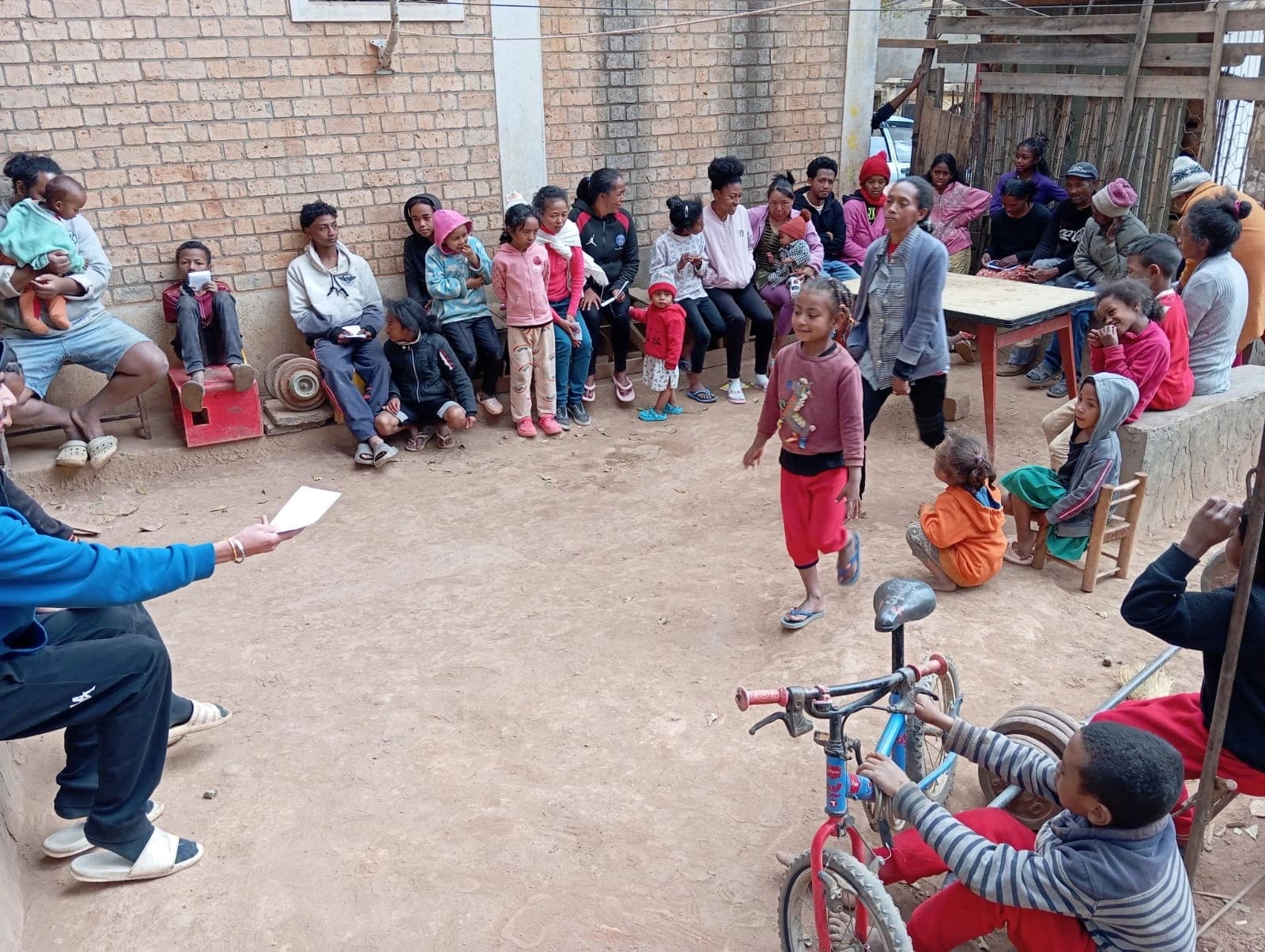 Community impact image showing children learning with technology